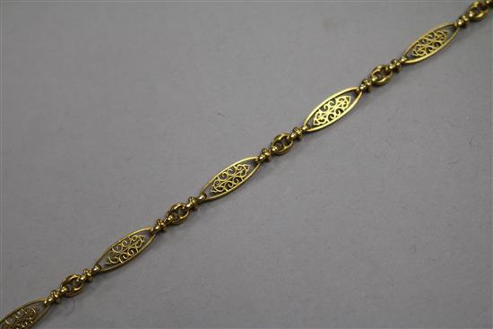 A yellow metal filigree bracelet, 7.7g